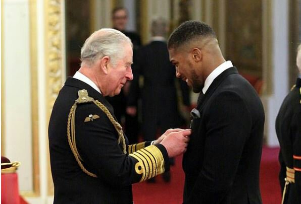 Joshua Receives Royal OBE Award From Prince Charles